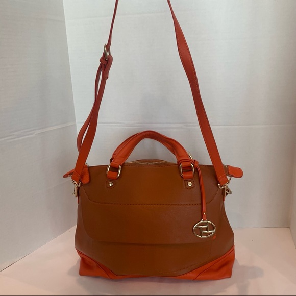 Orange handbag with a rust color body of bag and orange accent shoulder strap - Picture 3 of 16